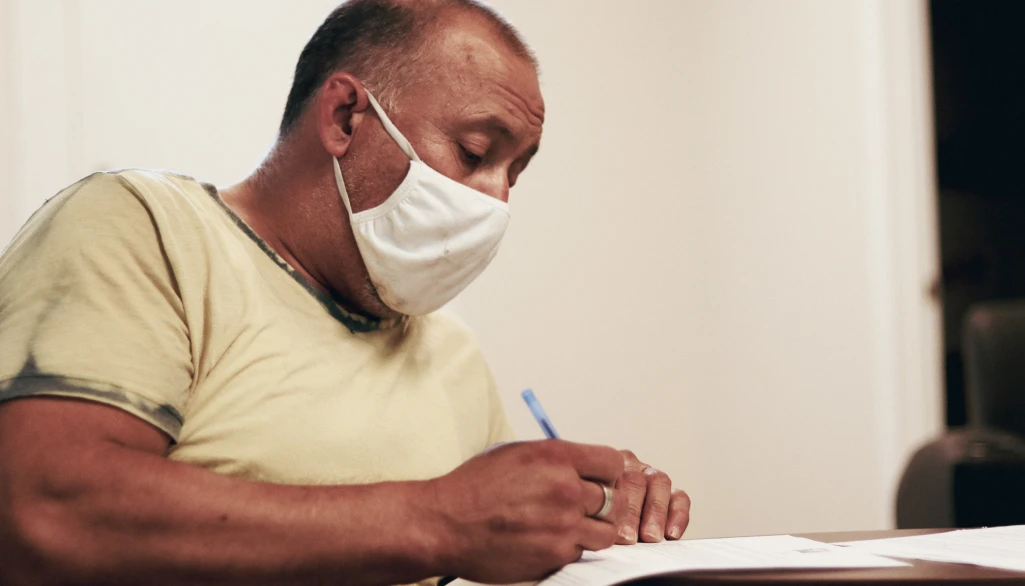 La Familia man with mask